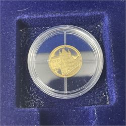 Nine miniature gold coins including 2017 ‘British Landmarks’ collection comprising six 14ct 0.5 gram coins, with certificates of authenticity and ownership, along with further 14ct 0.5 gram commemorative 1997 ‘Princess Diana’ coin with certificate of authenticity, and miniature gold coins commemorating the ‘History of Aviation - The Concorde’ and ‘The 85th Anniversary of the Year of the Three Kings’, housed in wooden display case