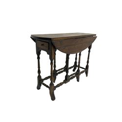 17th century design oak oval drop leaf table, fitted with drawer to each end, gate-leg action base on turned supports with shaped block feet