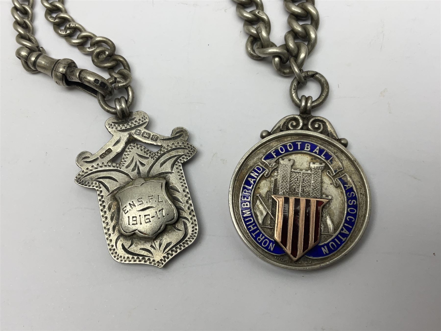 WW1 group of three medals comprising 1914-15 Star awarded to L-Cpl. W.J. Horspool R.War.R., British War Medal and Victory Medal awarded to A. Cpl. W.J. Horspool R.War.R.; WW1 British War Medal awarded to 3-8755 W.O.Cl.2. S. Paterson North'd Fus.; and hallmarked silver and enamel Northumberland Football Association Junior Cup Runners Up fob 1921-22 on silver chain (5)