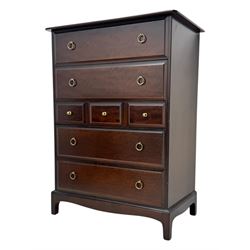 Stag Minstrel - mid-20th century chest, rectangular top over arrangement of three short and four long drawers, on bracket feet