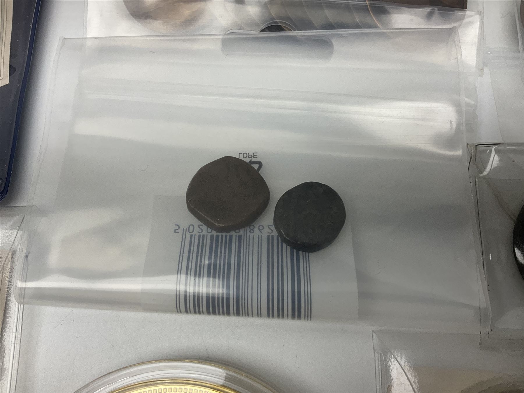 Mostly commemorative and fantasy coinage including commemorative crowns, 2018 'The Capsule Edition featuring the 2018 Paddington 50p coins' in display case, The Royal Mint Solomon Islands 2007 one ounce fine silver five dollars coin on card etc