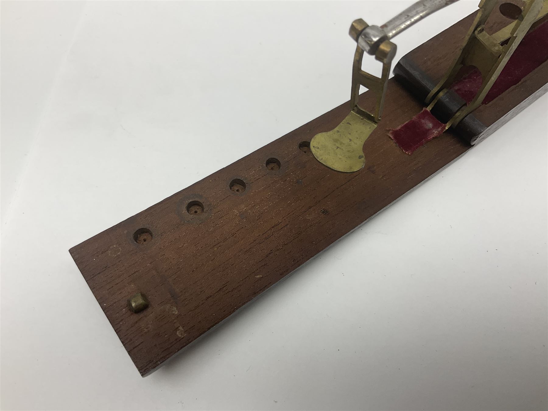 Brass sovereign scales and a part set of Georgian folding sovereign scales (one weight missing)