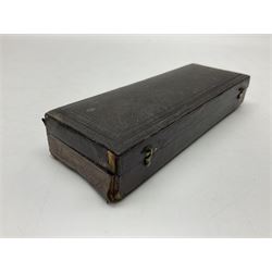 Late 19th/early 20th century boxwood and brass clinometer rule by Stanley, with inset magnetic compass, screw action protractor hinge divided to one degree with rise in inches per yard scale under, spirit level to one edge, marked 'W.F. Stanley Great Turnstile Holborn' with tables of distances, angles and thickness H16cm closed: in original leather covered case with instructions