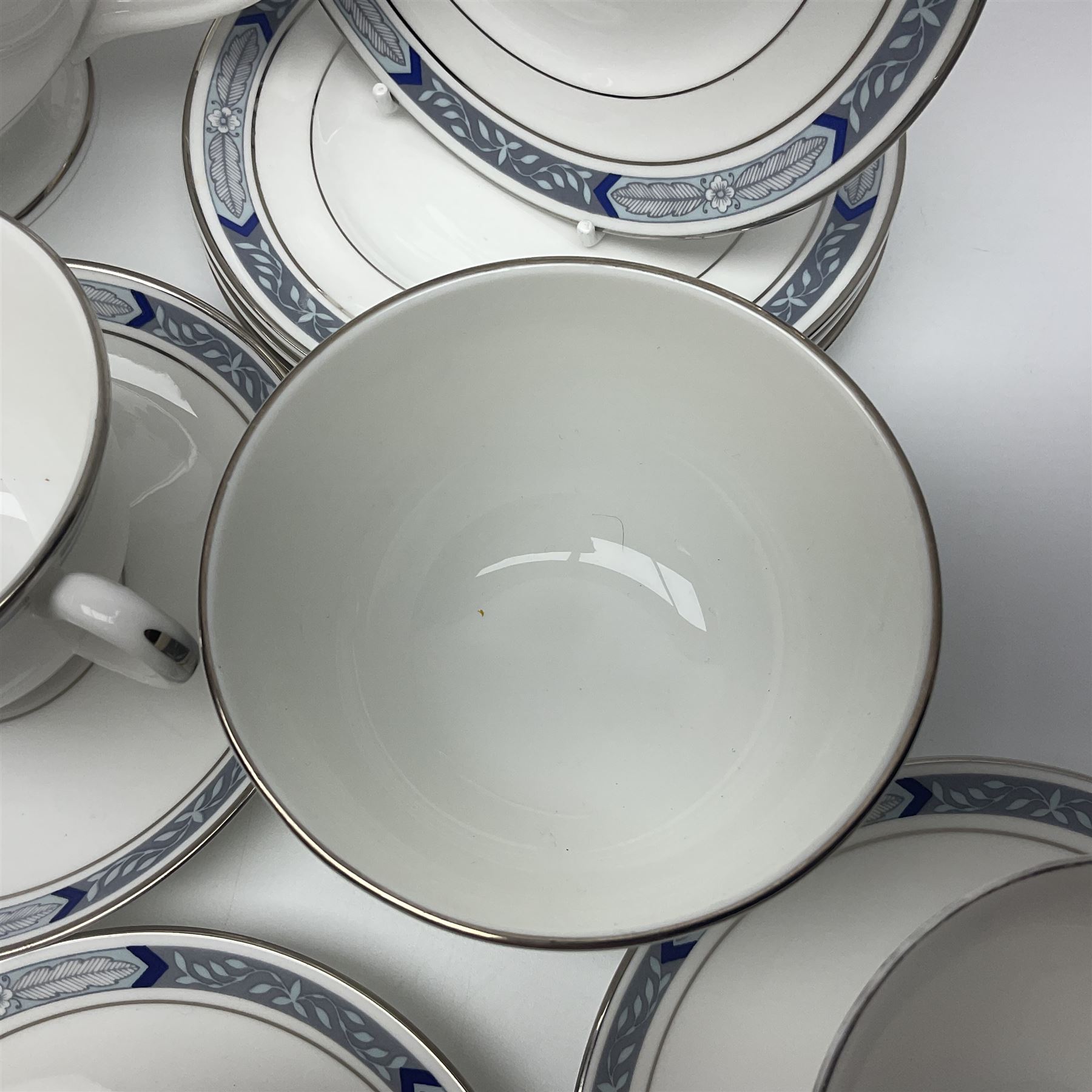 Royal Worcester Beaufort tea service, comprising teapot, milk jug, open saucier, eleven teacups, twelve saucers, eight dessert plates and one cake plate