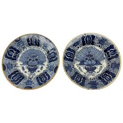 Pair of 18th/19th century Dutch Delft blue and white peacock plates, each with painted mark beneath, D22.5cm