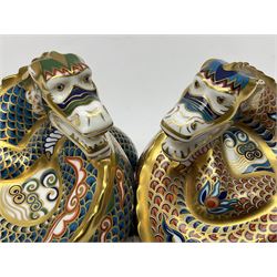 Two Royal Crown Derby paperweights, Dragon of Happiness, limited edition 1227/1500 and Dragon of Good Fortune, limited edition 1227/1500, both with gold stopper, hardwood base, certificate and with printed mark beneath