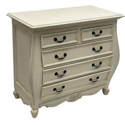 French design bombe shaped chest, moulded rectangular top over two short and three long drawers, on scrolled feet, in cream paint finish 