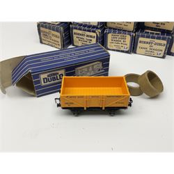 Hornby Dublo - twenty wagons including Cattle Truck; Low-Sided Wagons; Cable Drum Wagon; Tank Wagons for Shell Lubricating Oil, Esso and Mobil; Mineral Wagon; 20-Ton Bulk Grain Wagon; Goods Brake Van; Coal and Sand Wagons; Ventilated Van; Bogie Bolster Wagon; High Capacity Wagon etc; all in blue striped boxes (20)