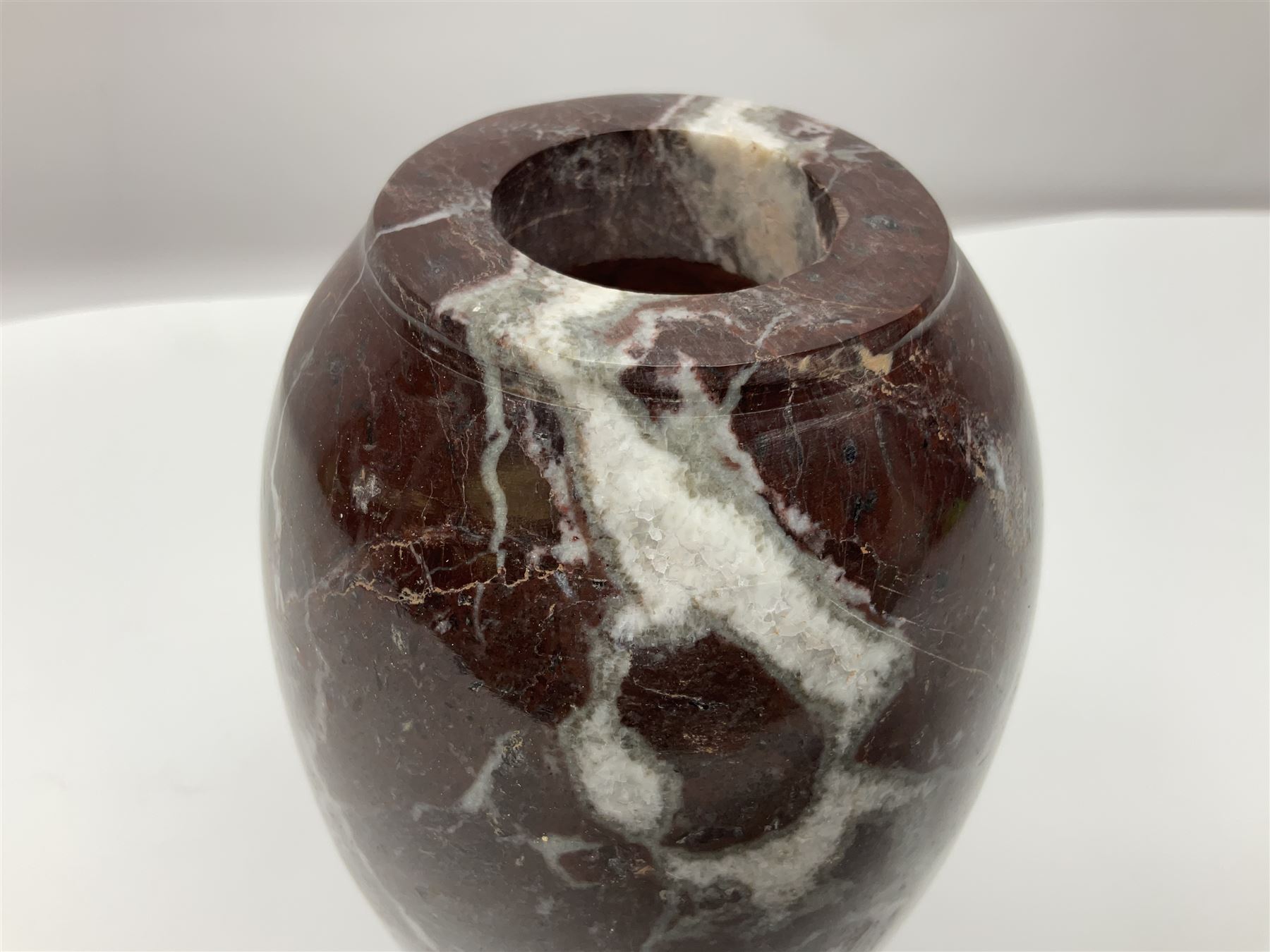 Red marble vase, of baluster form, H18cm