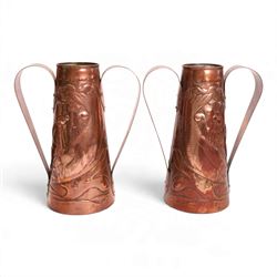Pair of Newlyn Arts and Crafts copper twin handled vases, ff tapered form, repousse decora...