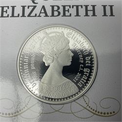 Four Queen Elizabeth II Alderney silver proof five pound coin covers, comprising 2021 'Gothic', 2022 'Platinum Jubilee', 2022 'Royal National Lifeboat Institution' and 2022 'Royal National Lifeboat Institution Hand Painted', all in Harrington and Byrne folders
