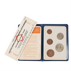 Approximately 250 grams of Great British pre-1920 silver coins, together with further British and world coins, in tartan biscuit tin