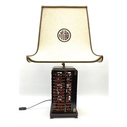 Vintage Chinese abacus table lamp, with double light fitting, and cream fabric shade decorated with characters, overall H73cm