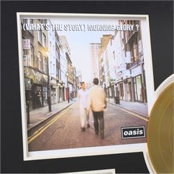 Oasis What's The Story Morning Glory? commemorative gold disc display, featuring gold coloured record, album artwork and track listing, framed and glazed, H40cm, W60cm
