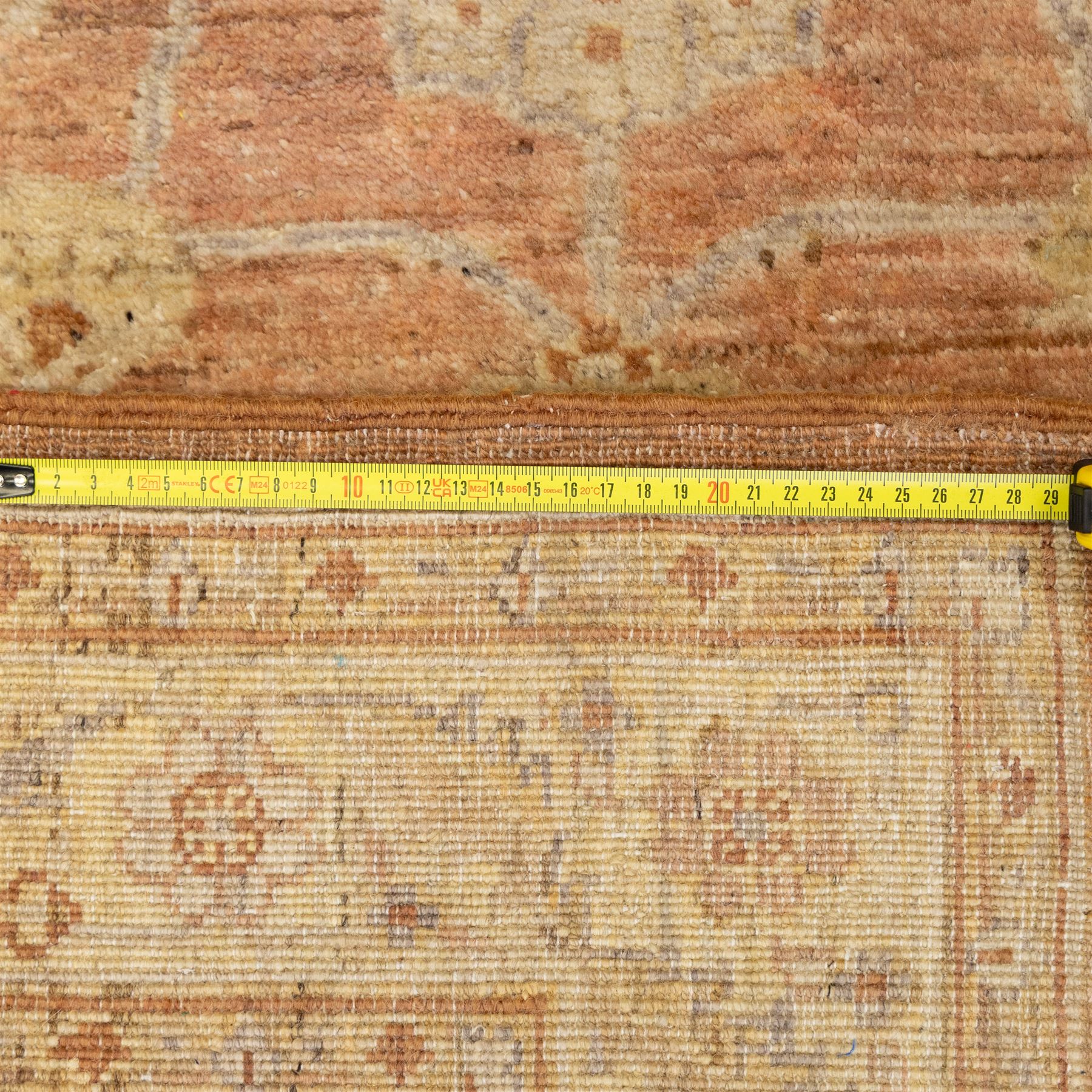 Afghan Ziegler rug, terracotta field with an all-over design of palmettes and stylized foliage in soft beige and gold tones, with a Persian Qum silk prayer rug, with a central tree of life and flowering branches and birds, within multiple floral borders, 88x125cm (2)