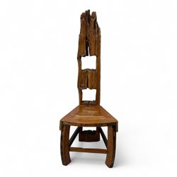 20th century driftwood sculptural hall chair, solid triangular seat over shaped apron, high ladder back formed from weathered and irregular timber, raised on curved legs united by H-stretcher
