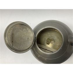 Liberty & Co Tudric pewter three piece tea service, comprising teapot with woven reed handle, twin handled open sucrier, and milk jug, each of squat form with planished finish, each impressed beneath Tudric Pewter Ware 01537 Made in England, together with a matched unmarked tray