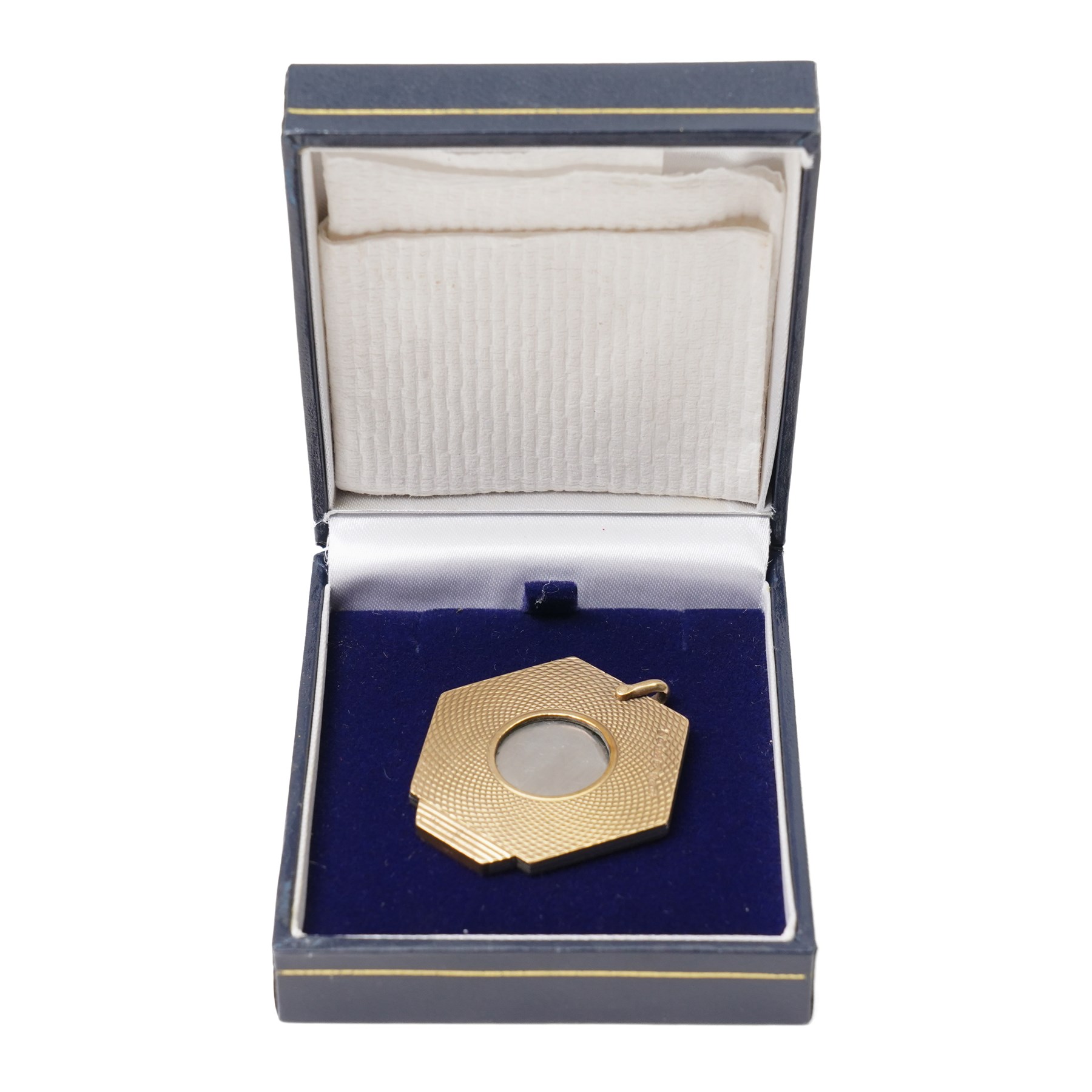 Asprey, 9ct gold hexagonal cigar cutter, hallmarked, with engine turned decoration  