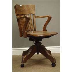  Early 20th century oak office swivel desk chair, W59cm  