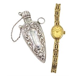  Accurist 9ct gold ladies quartz wristwatch, hallmarked and a silver scent bottle, Sheffield import marks 1996
