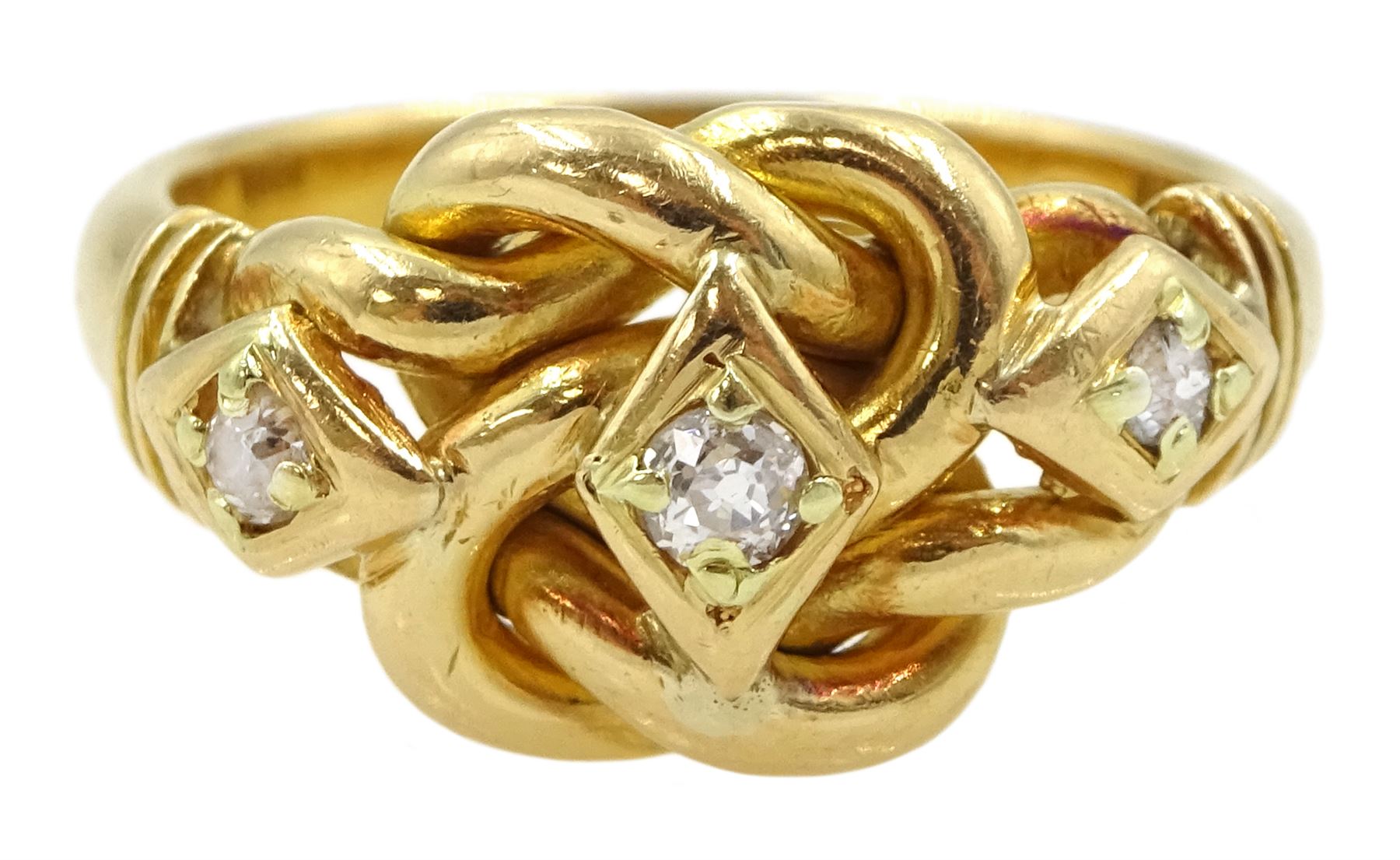 Edwardian 18ct gold three stone old cut diamond love knot ring, maker's mark EK, London 1903