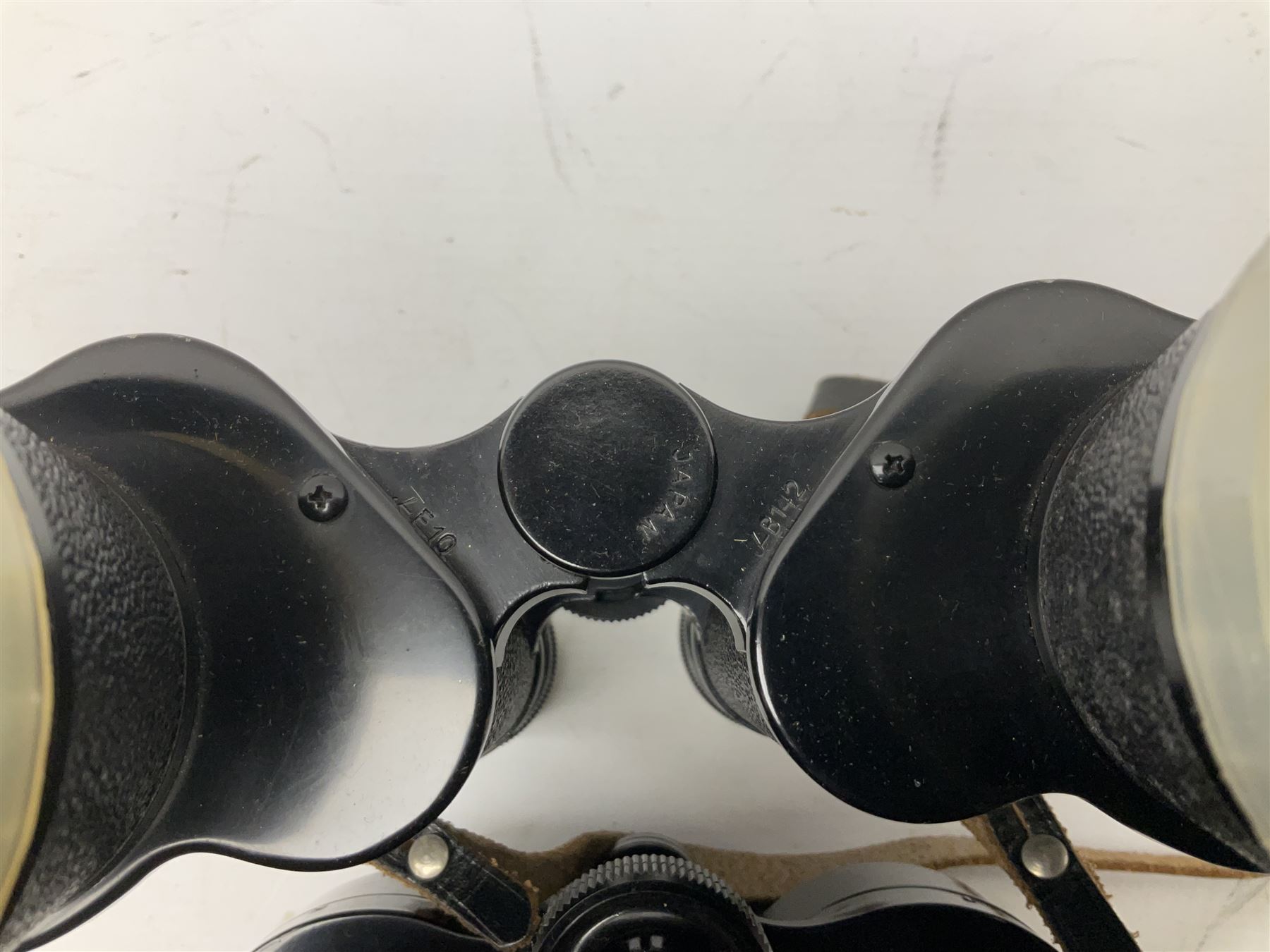 Ten cased pairs of binoculars, to include Rainbow 20x60, Barr & Stroud 7x, Yashica 7x50, Ross London Stepmur 10x50, Wray London Defiant 10x35, Canon 8x30 etc