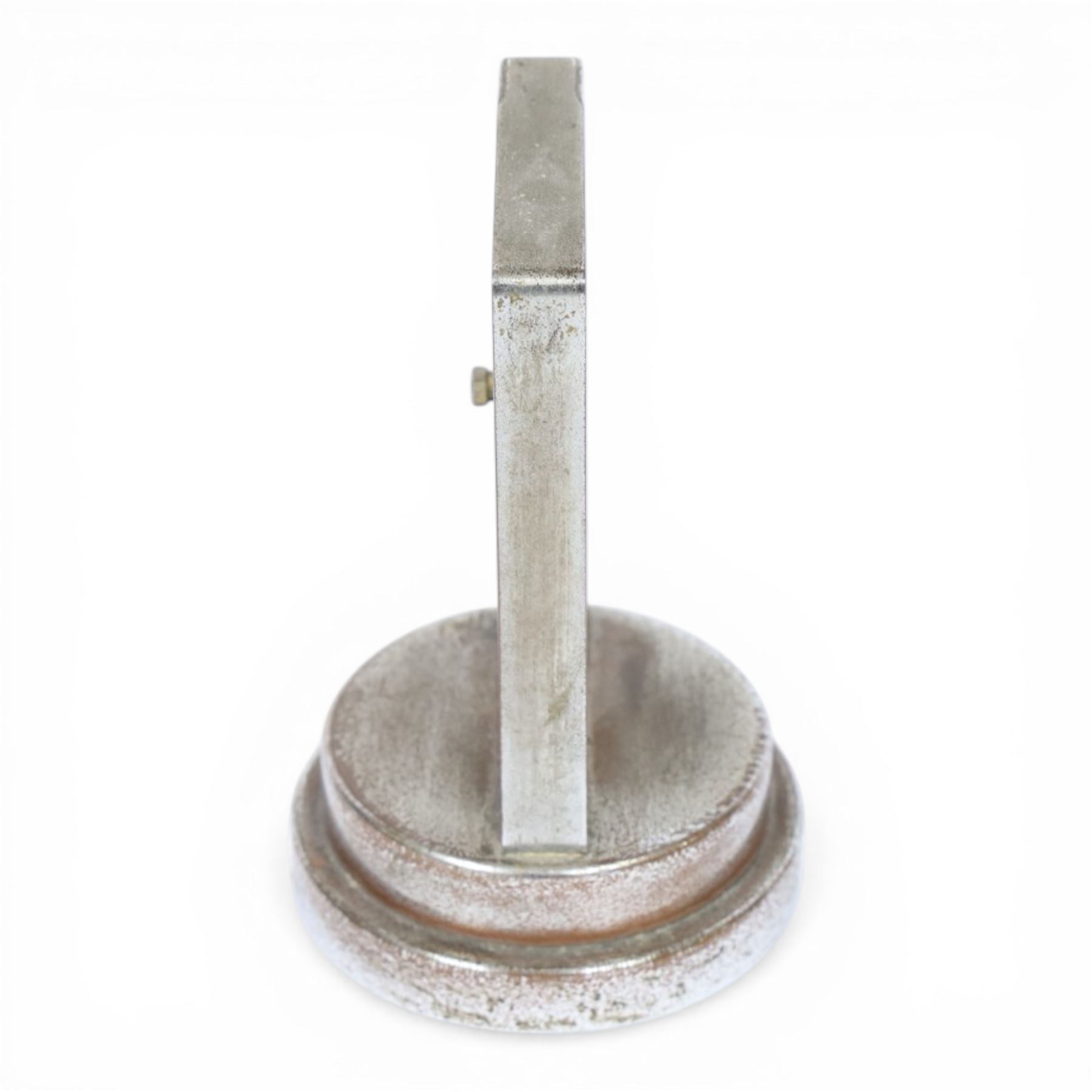 Art Deco chrome plated desk aneroid barometer by Zeiss Ikon, with frosted glass panel to rear, upon raised on a stepped circular base with instructions printed on the underside, H16cm