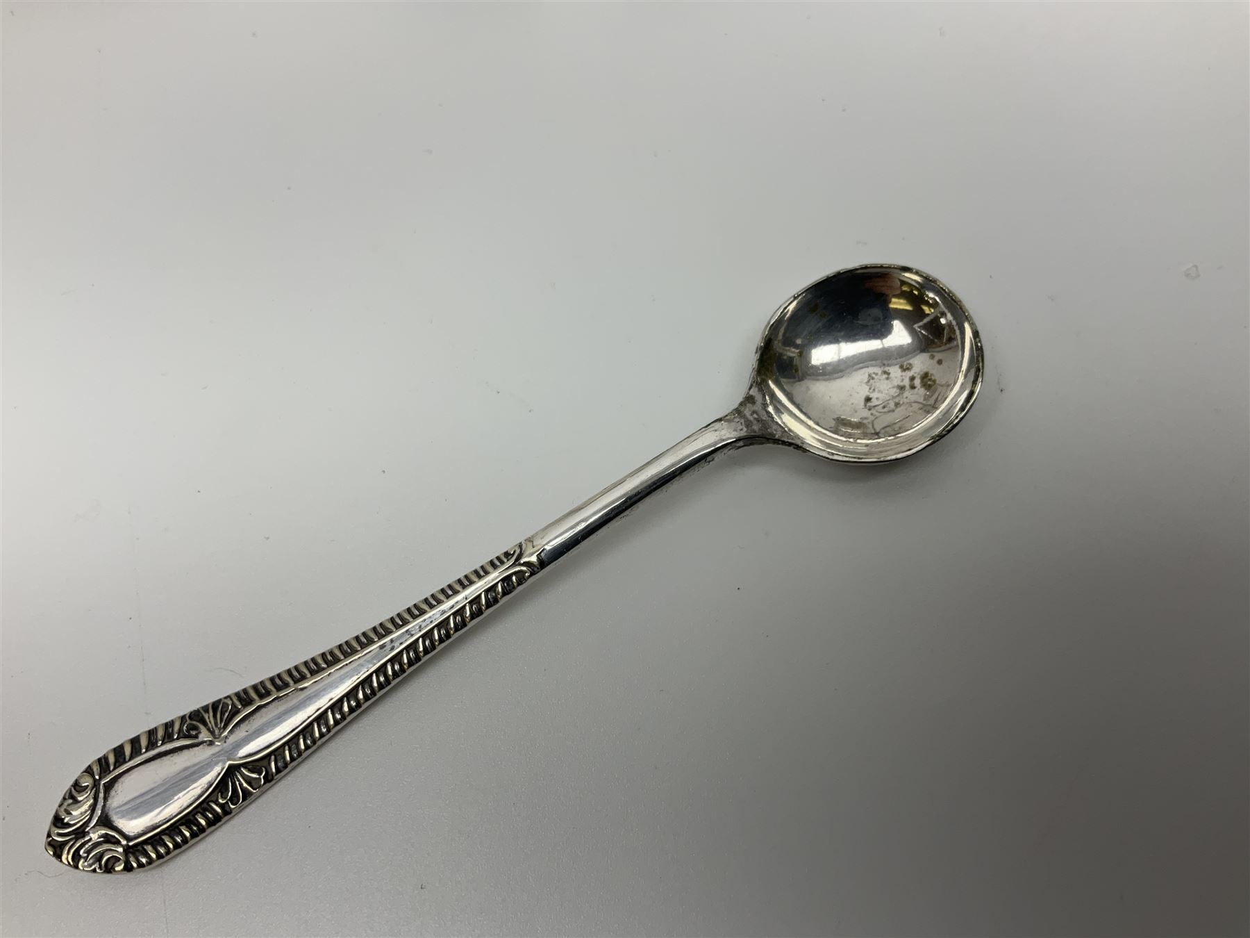 Sheffield silver-plated cruet set, comprising mustard pot, open glass salt and pepper pot on stand, together with a collection of silver plated spoons