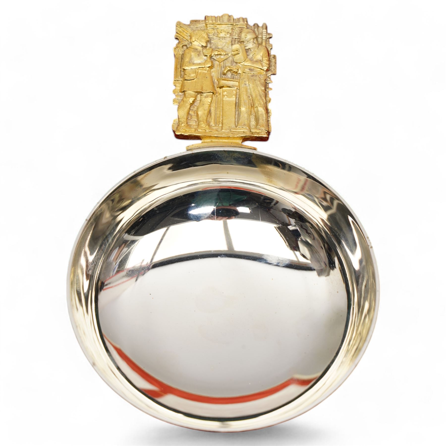 York Minster limited edition silver bowls, commemorating the 500th anniversary of the completion of the Gothic Minster, designed by Hector Miller for Aurum, the gilded handle decorated with stonemasons and blacksmiths working, with planished finish to exterior, no. 326 and 327/1000,  hallmarked Hector Miller, London 1972, D11.5cm, with certificates and original case