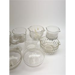 Seven 19th century and later double lip glass rinsers of various design, together with a pair of Edwardian cut glass finger bowls, and four Edwardian champagne glasses with engraved decoration. 