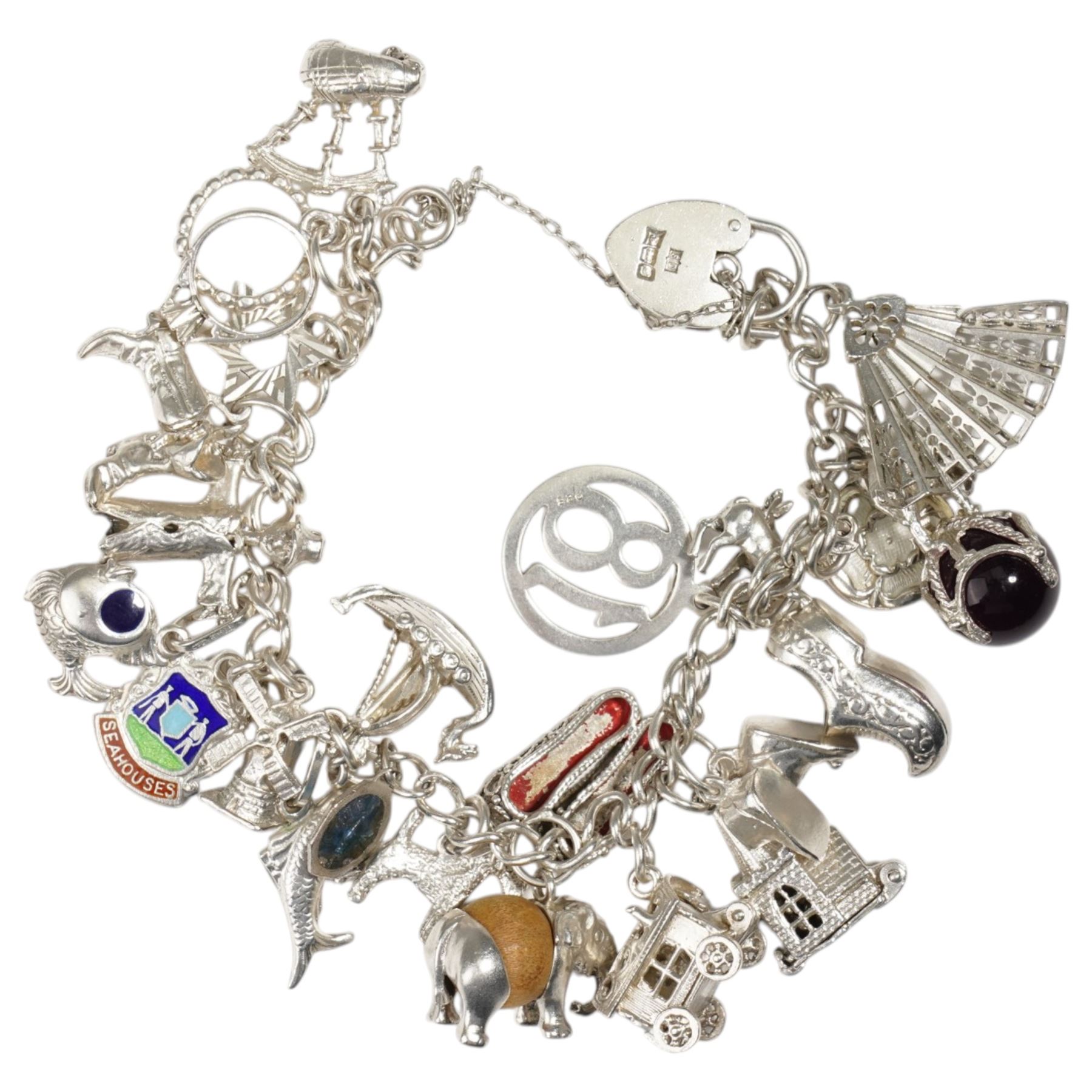 Silver jewellery including charm bracelet, bangle, stone set earrings and matching pendant and two heart pendants