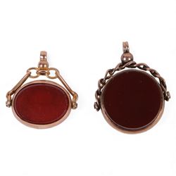 Two 9ct gold spinner fobs, one set with bloodstone and carnelian, the other with engraved ...