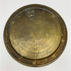 Early 20th century Cairoware charger, the brass dish of circular form with silver and copper inlay depicting a three tiered religious figural scene, within a script border, D42cm