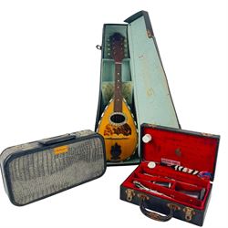 Carlo Ricordo bowl back mandolin, Selmer clarinet and a Boosey & Hawkes clarinet, all cased
