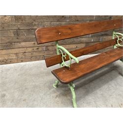 Cast iron and wood slate bench painted in green