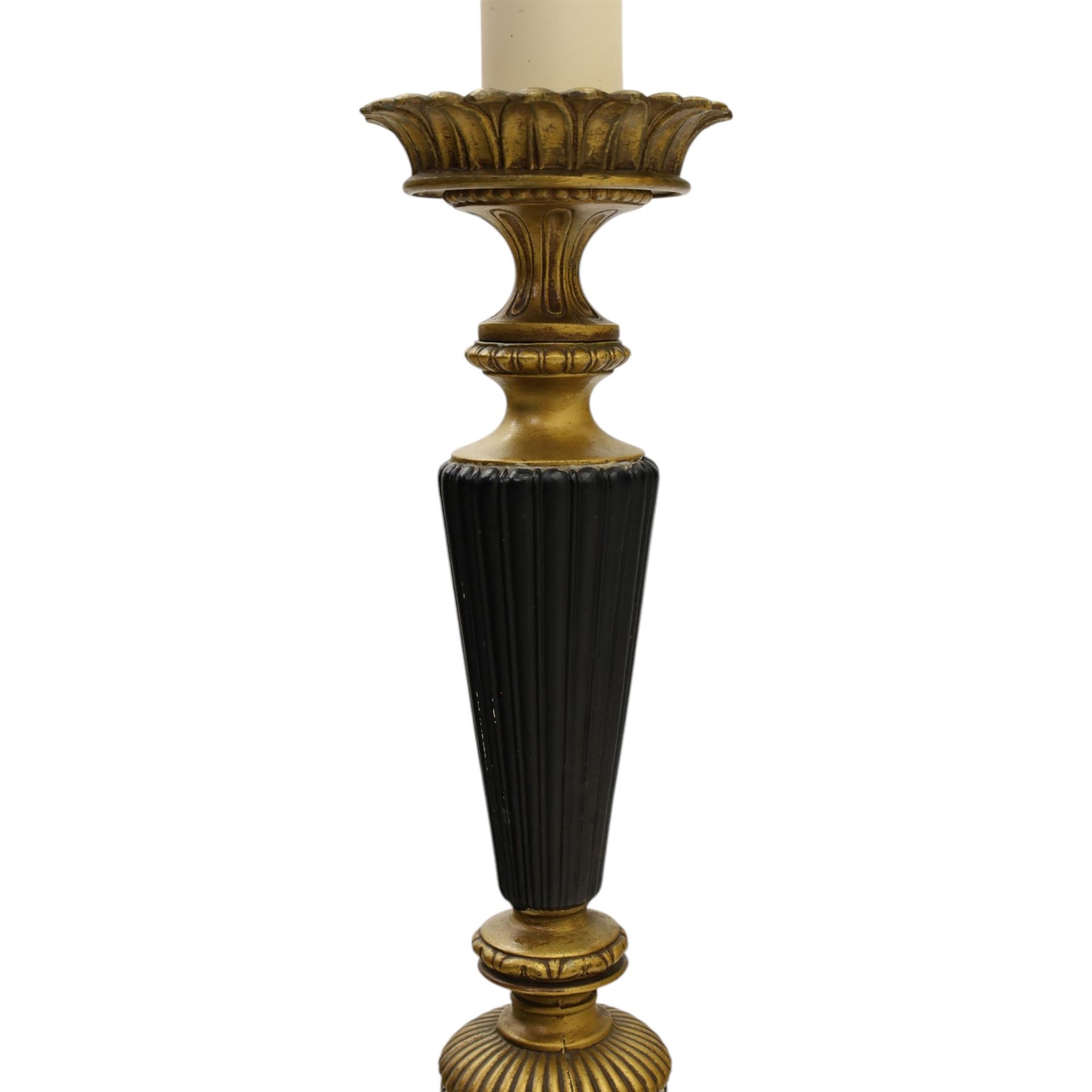 Neoclassical design table lamp, black painted and gilt metal column with fluted central section, foliate and stiff leaf cast decoration, on circular spreading base, fitted with shade frame