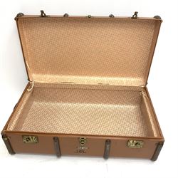 A Vintage ribbed travel trunk, with brown canvas, twin locks to front and carry handles to sides, L90cm. 