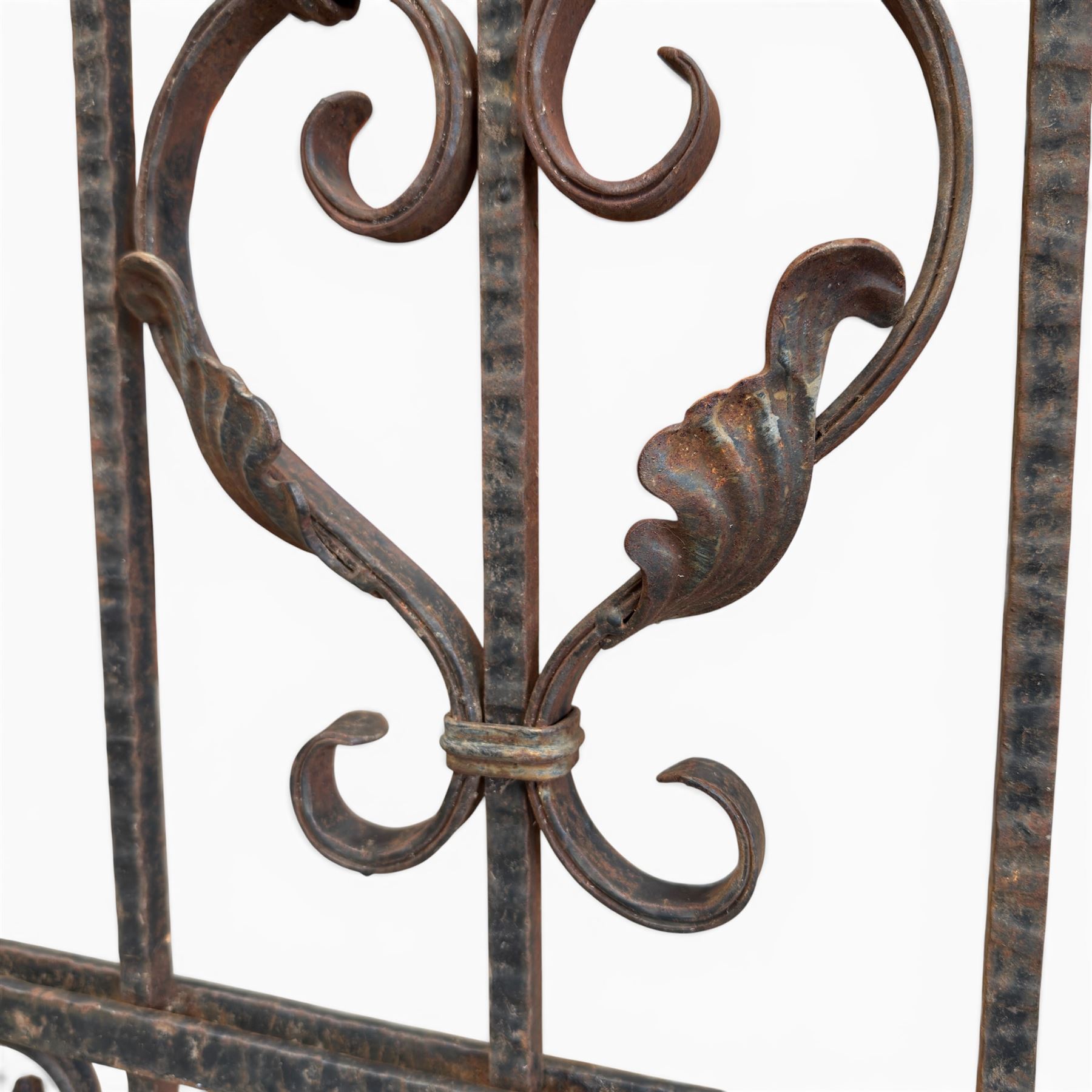 Victorian wrought iron vineyard gate, with ornate scrollwork and foliate acanthus leaf decoration, shaped cresting and central decorative panel, finished in rustic black painted finish