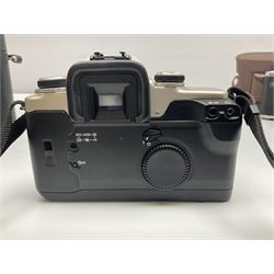 Canon EOS 50e camera body, serial no 8305671 with 'Canon Zoom EF 35-135mm 1:4-5.6' lens together with Halina 35X super camera body, with 'Halina Anastigmat f.c. 1:3.5 f=45mm' lens and other camera equipment 