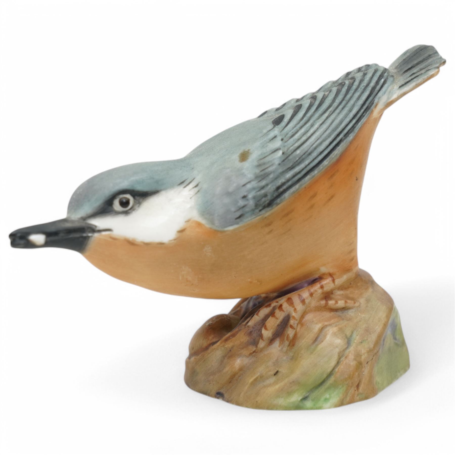 Collection of bird figures, to include various Beswick and Royal Worcester examples, comprising 'Wood Warbler' 'Nuthatch' 'Robin' 'Blue Tit' etc, together with an onyx dish with cold painted bronze Kingfisher (11)
