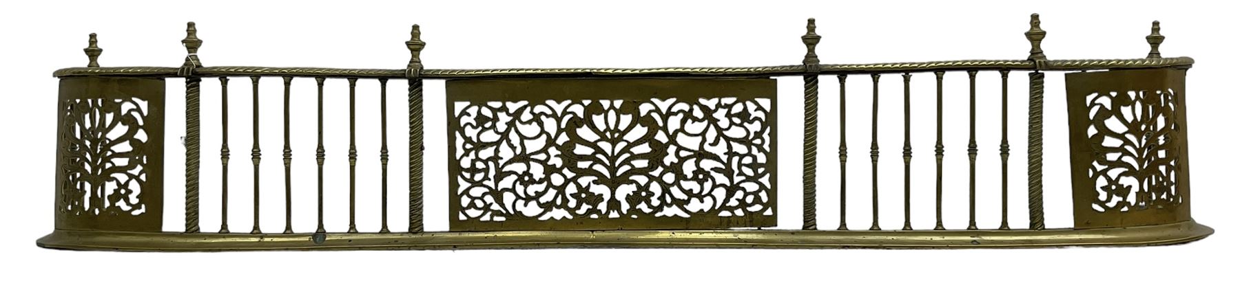 Early 19th century Irish brass D-shaped brass fender, twist borders and balustrade supports, central pierced frieze panel decorated with scrolling foliage and central anthemion motif  