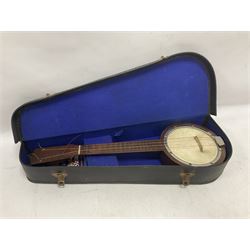 Brunswick Ukulele in a soft case with a earlier 20th century Banjo Ukulele in a lined and fitted case