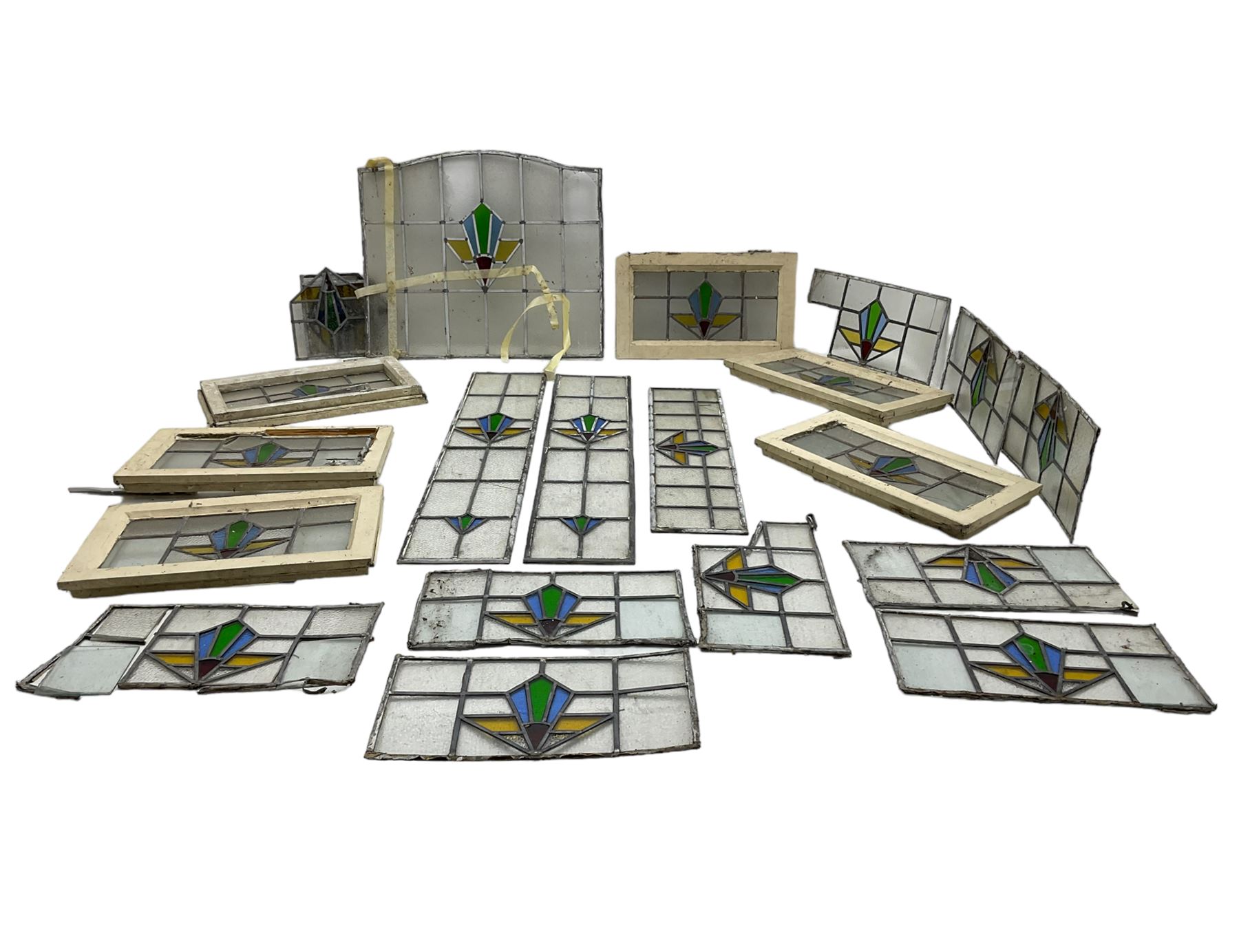 1930s external door with stained leaded glass panel (86cm x 203cm), six small stained glass windows in wooden frames (W52cm); and various loose stained leaded glass panels