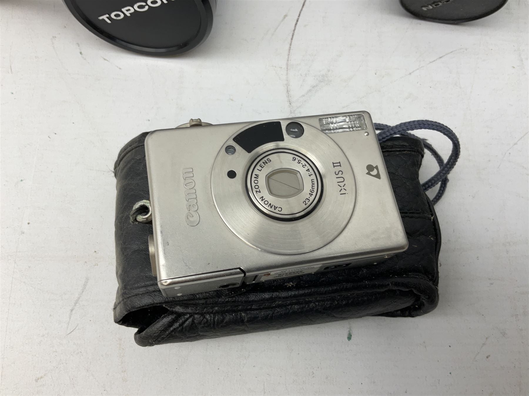 Quantity of cameras and lenses to include Topcon Unirex camera etc with cases