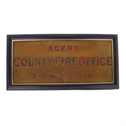 Framed County Fire Office brass plaque, inscribed in red enamelled letters 'Agent County Fire Office Founded 1806', overall 26cm x 51cm, together with Phoenix Assurance Co Ltd copper letter box cover, 7cm x 45.5cm, and two bronze signs, the first detailed 'Phoenix Assurance Company Limited', the second 'London Guarantee and Accident Company Limited' second example 21.5cm x 25cm 