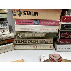 Large quantity of books, predominantly paperbacks, of WW2 and military interest.