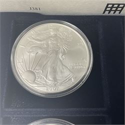 Four one ounce fine silver coins, forming 'The 2007 Famous World Silver Coin Collection', comprising United States eagle, Australian kookaburra, Chinese panda and Canadian maple leaf, cased with Westminster certificate 