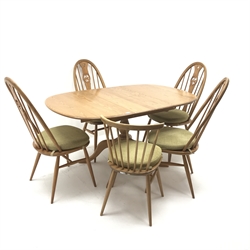 Ercol Chester elm extending pedestal dining table, turned column on four shaped supports (W148cm, H73cm, D90cm) and set four elm swan high back dining chairs (W48cm) and a Windsor swept back chair