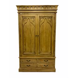 Gothic polished pine double wardrobe, fitted with four drawers
