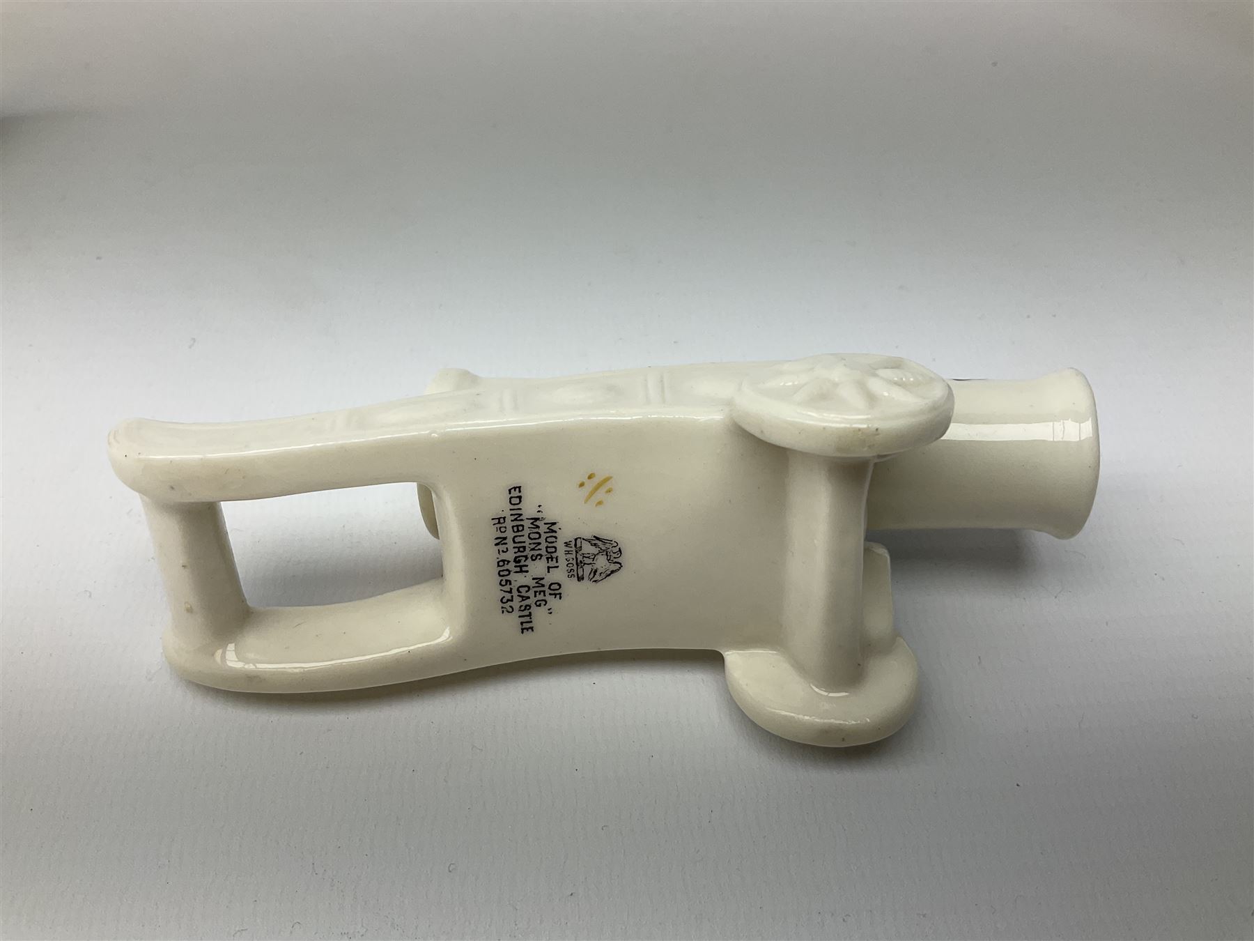 Three pieces of crested ware, comprising grenade detailed 'The Mills Hand Grenade' with Filey Crest, marked beneath Grafton China, a cannon with crest banner detailed 'Sterlini Oppidvm', marked beneath W H Goss, and a submarine with Tunbridge Wells crest, marked beneath Arcadian China 